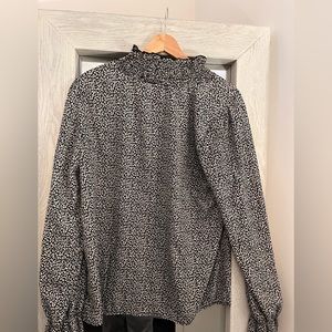 Black turtle neck, cheetah black and white